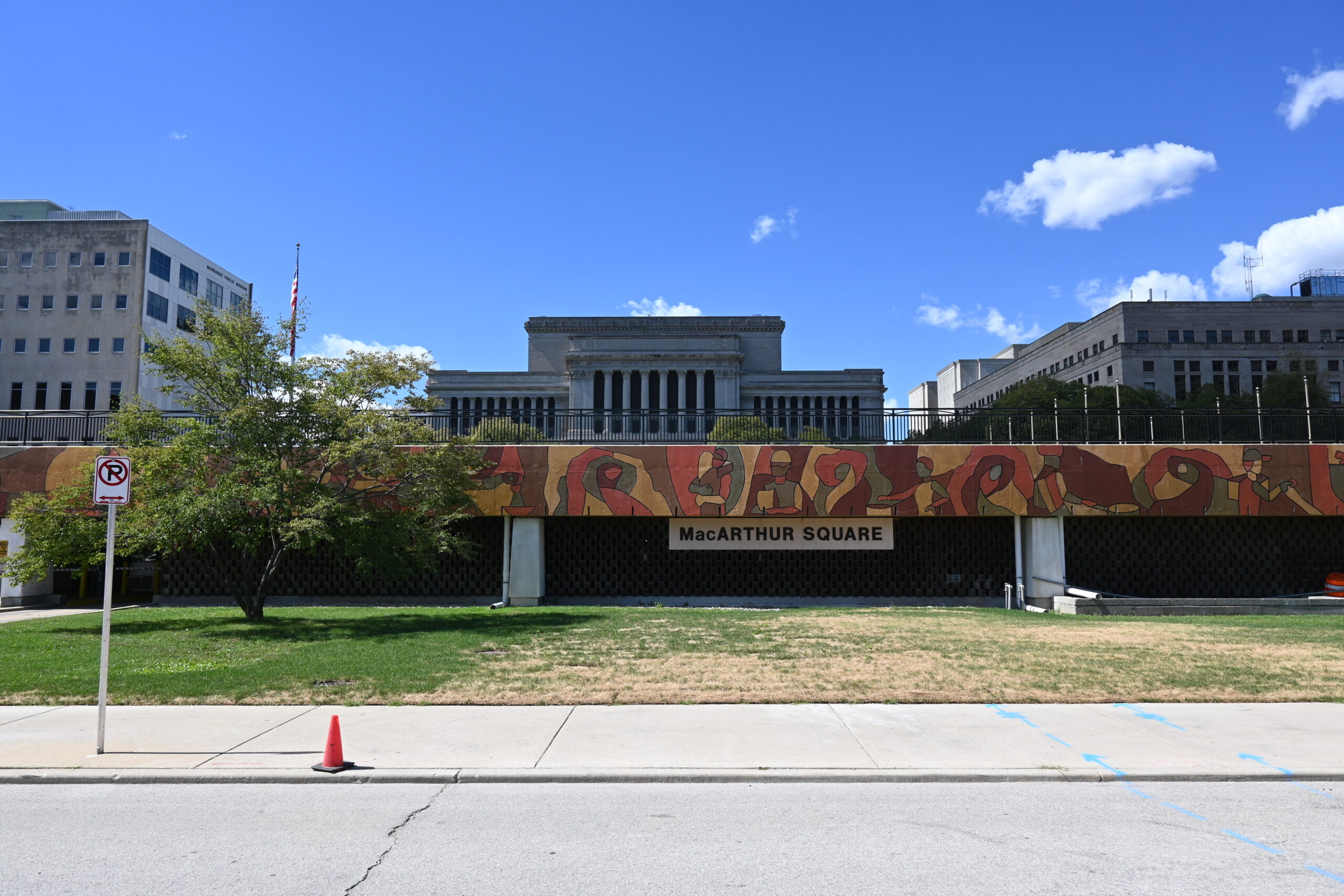 The Hero in You mural in front of MacArthur Square.