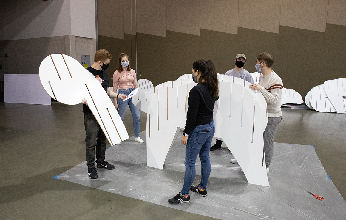 Artists put together pieces of the Massimal.