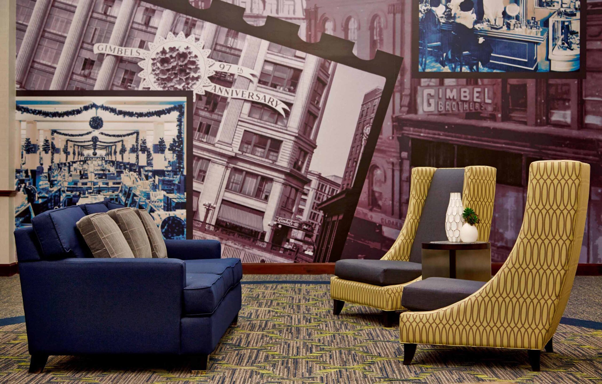 The Residence Inn lobby features a wall mural of old photos of Milwaukee.