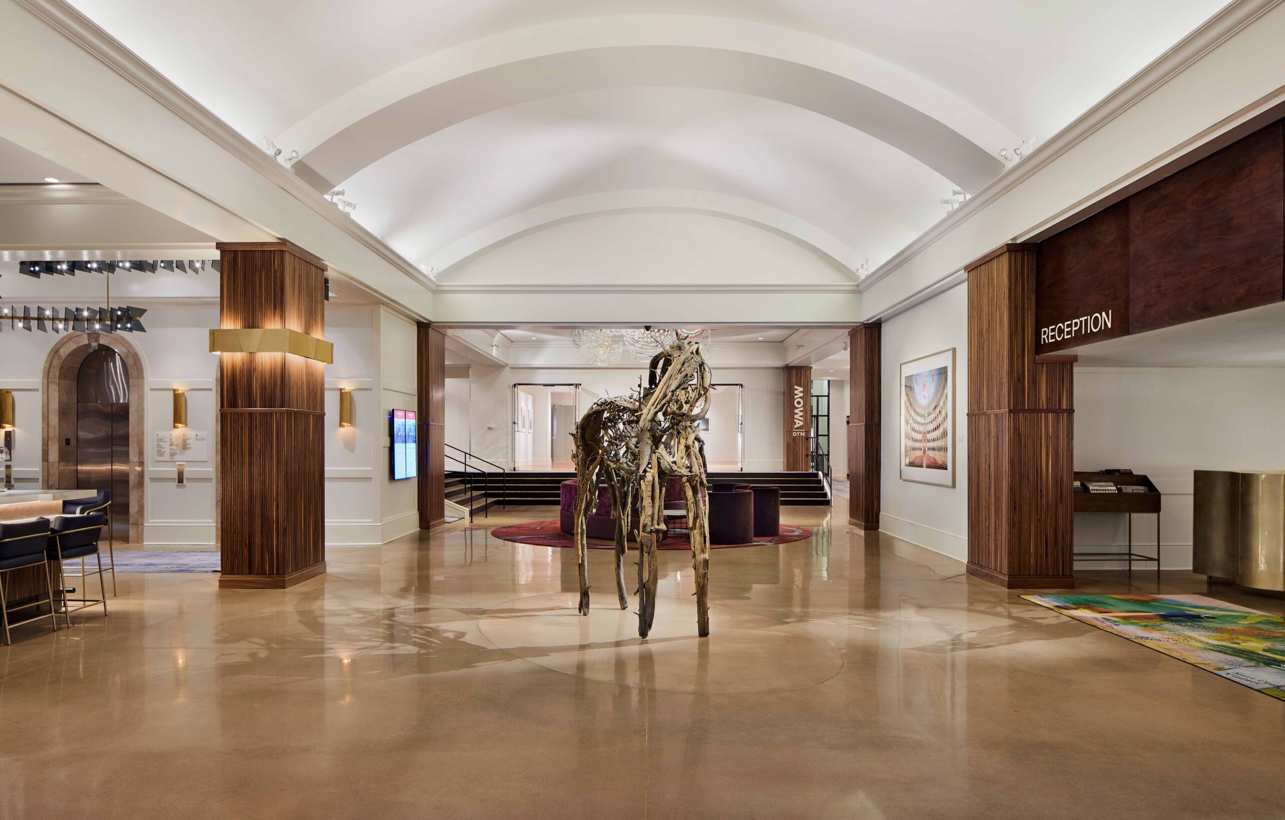 The Saint Kate lobby features a sculpture of a horse.